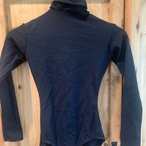 Black long sleeve turtleneck leotard.